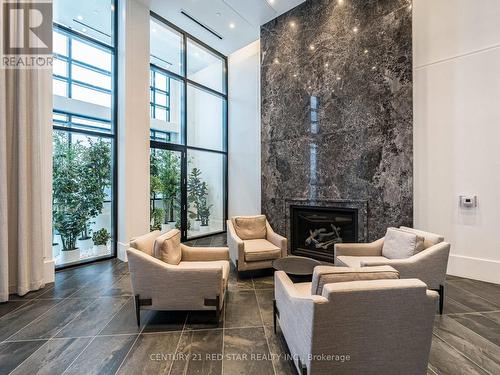 Main Entrance - 119 - 2075 King Road, King, ON - Indoor With Fireplace