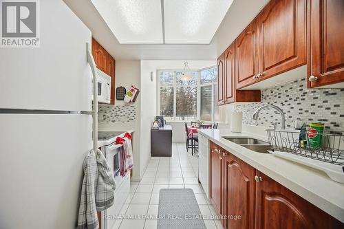 109 - 80 Alton Tower Circle, Toronto, ON - Indoor Photo Showing Kitchen With Double Sink