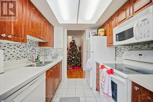 109 - 80 Alton Tower Circle, Toronto, ON - Indoor Photo Showing Kitchen With Double Sink