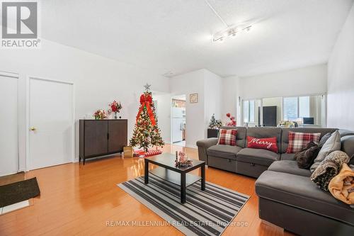 109 - 80 Alton Tower Circle, Toronto, ON - Indoor Photo Showing Living Room