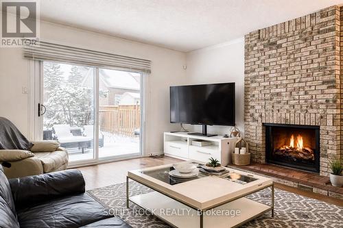 1 Bennett Street, Ottawa, ON - Indoor Photo Showing Living Room With Fireplace