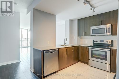 305 - 3985 Grand Park Drive, Mississauga, ON - Indoor Photo Showing Kitchen With Double Sink