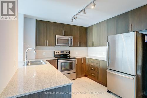 305 - 3985 Grand Park Drive, Mississauga, ON - Indoor Photo Showing Kitchen With Double Sink