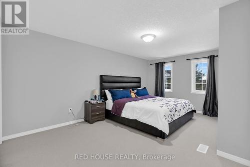 E30 - 110 Activa Avenue, Kitchener, ON - Indoor Photo Showing Bedroom
