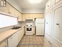 Ph7 - 1700 Eglinton Avenue E, Toronto, ON  - Indoor Photo Showing Kitchen With Double Sink 