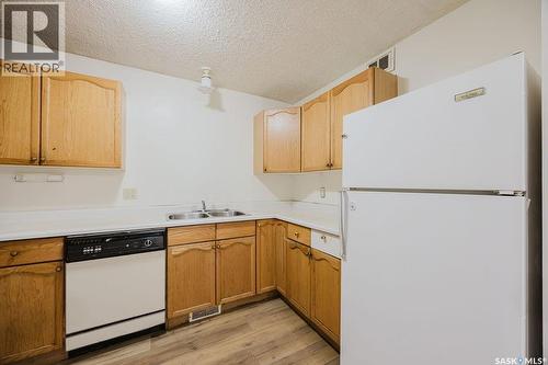 337 U Avenue S, Saskatoon, SK - Indoor Photo Showing Kitchen With Double Sink