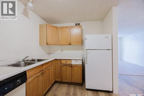 337 U Avenue S, Saskatoon, SK - Indoor Photo Showing Kitchen With Double Sink