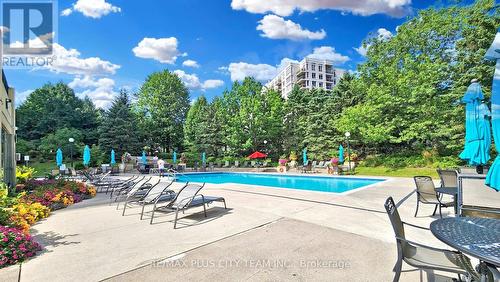 414 - 1890 Valley Farm Road, Pickering, ON - Outdoor With In Ground Pool