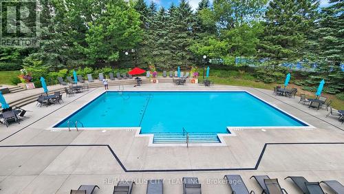 414 - 1890 Valley Farm Road, Pickering, ON - Outdoor With In Ground Pool With Backyard