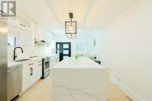 Main & 2Nd - 70 Carlaw Avenue, Toronto, ON - Indoor Photo Showing Kitchen With Double Sink With Upgraded Kitchen