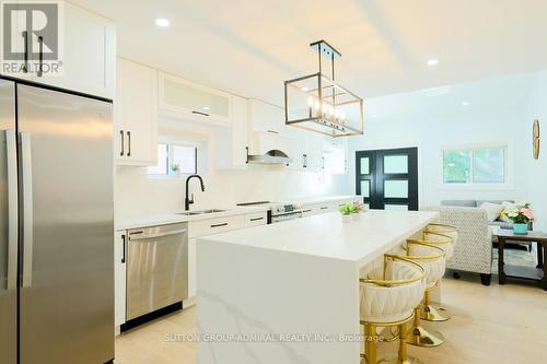 Main & 2Nd - 70 Carlaw Avenue, Toronto, ON - Indoor Photo Showing Kitchen With Stainless Steel Kitchen With Double Sink With Upgraded Kitchen