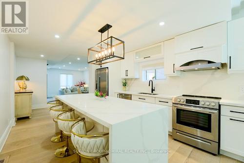 Main & 2Nd - 70 Carlaw Avenue, Toronto, ON - Indoor Photo Showing Kitchen With Double Sink With Upgraded Kitchen