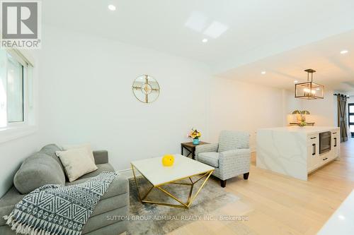 Main & 2Nd - 70 Carlaw Avenue, Toronto, ON - Indoor Photo Showing Living Room