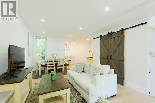 Main & 2Nd - 70 Carlaw Avenue, Toronto, ON - Indoor Photo Showing Living Room
