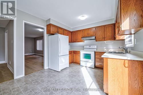 65 Michener Crescent, Markham, ON - Indoor Photo Showing Kitchen With Double Sink