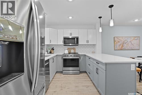 304 Mcormond Drive, Saskatoon, SK - Indoor Photo Showing Kitchen With Upgraded Kitchen