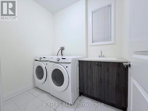 20 Daffodil Road, Springwater, ON - Indoor Photo Showing Laundry Room