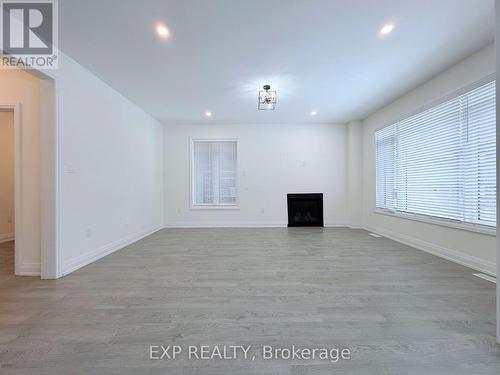 20 Daffodil Road, Springwater, ON - Indoor With Fireplace