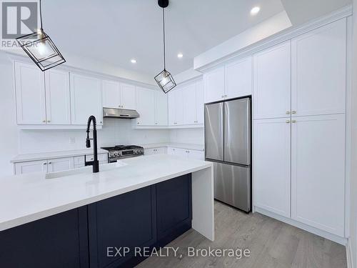 20 Daffodil Road, Springwater, ON - Indoor Photo Showing Kitchen With Stainless Steel Kitchen