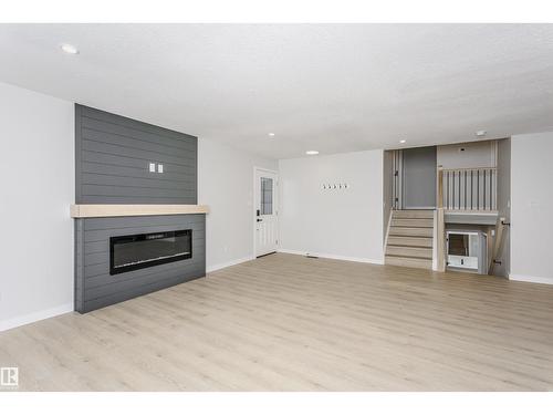 67 Lambert Cr, St. Albert, AB - Indoor Photo Showing Living Room With Fireplace