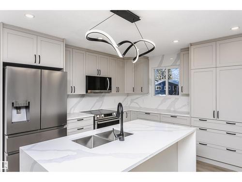 67 Lambert Cr, St. Albert, AB - Indoor Photo Showing Kitchen With Double Sink With Upgraded Kitchen