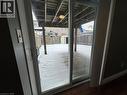 Doorway to outside with plenty of natural light and wood finished floors - 211 Snowdrop Crescent Unit# Lower, Kitchener, ON  - Indoor Photo Showing Other Room 