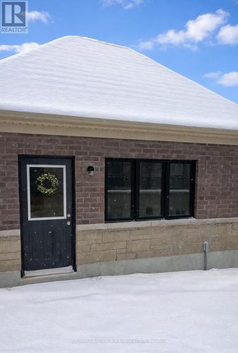 VIRTUALLY STAGED - Man dr access to garage - 156 Alcorn Drive, Kawartha Lakes (Lindsay), ON - Outdoor