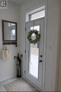 VIRTUALLY STAGED - Entrance from Garage into home - 