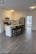 VIRTUALLY STAGED - Open concept w/quartz counters - 