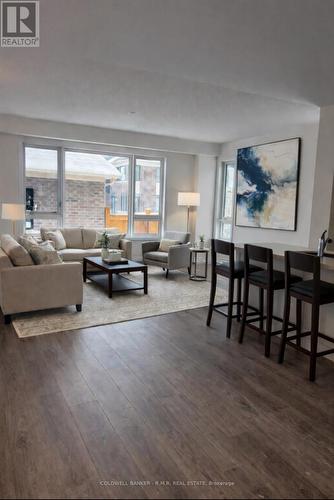VIRTUALLY STAGED - Open concept, large windows - 156 Alcorn Drive, Kawartha Lakes (Lindsay), ON - Indoor Photo Showing Living Room