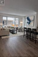 VIRTUALLY STAGED - Open concept, large windows - 