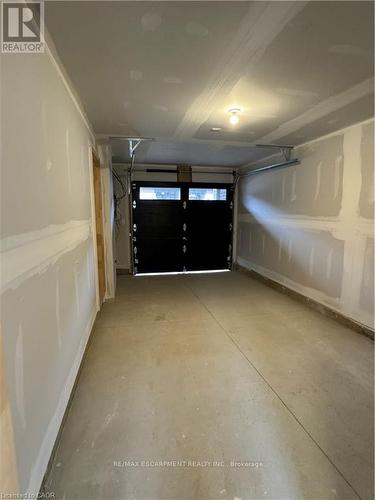 23 - 120 Court Drive, Brant, ON - Indoor Photo Showing Garage
