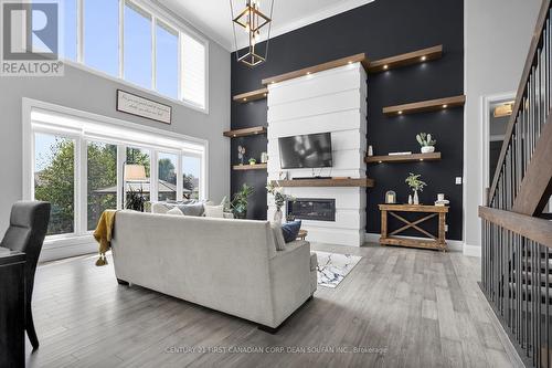 405 Darcy Drive, Strathroy-Caradoc (Ne), ON - Indoor Photo Showing Living Room With Fireplace