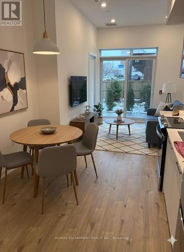 Virtually Staged - 102 - 500 Plains Road E, Burlington, ON - Indoor Photo Showing Dining Room