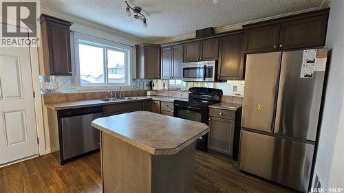 30 235 Rosewood Boulevard E, Saskatoon, SK - Indoor Photo Showing Kitchen With Double Sink