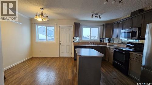 30 235 Rosewood Boulevard E, Saskatoon, SK - Indoor Photo Showing Kitchen With Double Sink