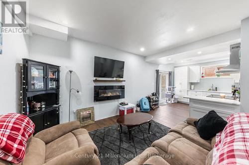 117 Allegra Drive, Wasaga Beach, ON - Indoor Photo Showing Living Room With Fireplace