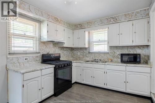 1239 Mcewan Avenue, Windsor, ON - Indoor Photo Showing Kitchen With Double Sink