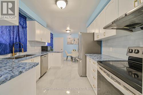 7517 Lully Court, Mississauga, ON - Indoor Photo Showing Kitchen With Double Sink