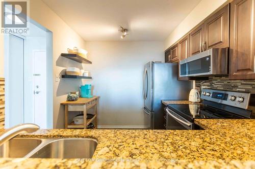 1206 - 330 Rathburn Road W, Mississauga, ON - Indoor Photo Showing Kitchen With Stainless Steel Kitchen With Double Sink