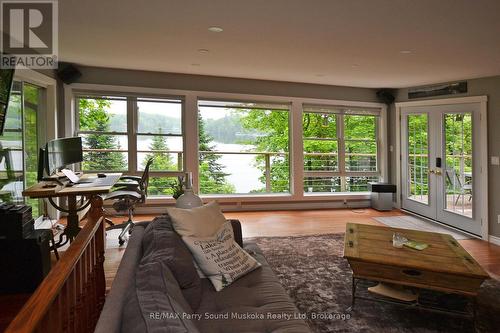 Stunning Views - 84 Captain Estates Road, Whitestone (Hagerman), ON - Indoor Photo Showing Living Room