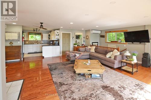 Bright open plan - 84 Captain Estates Road, Whitestone (Hagerman), ON - Indoor Photo Showing Living Room