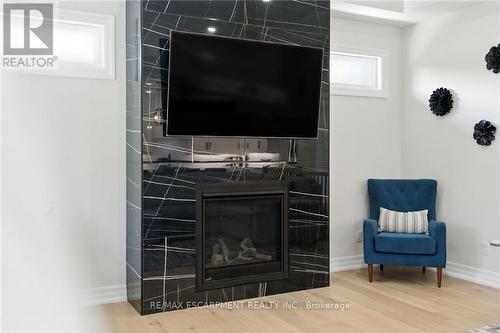 270 Charles Street, Norfolk, ON - Indoor Photo Showing Living Room With Fireplace