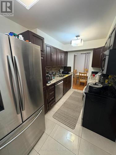 # 1402 - 177 Linus Road, Toronto, ON - Indoor Photo Showing Kitchen