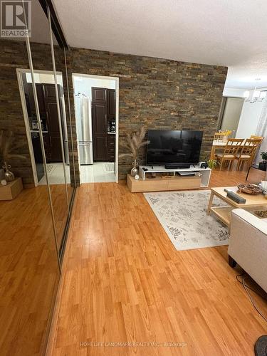 # 1402 - 177 Linus Road, Toronto, ON - Indoor Photo Showing Living Room