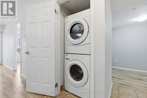 In-suite Laundry - 107 - 1045 Nadalin Heights, Milton, ON - Indoor Photo Showing Laundry Room