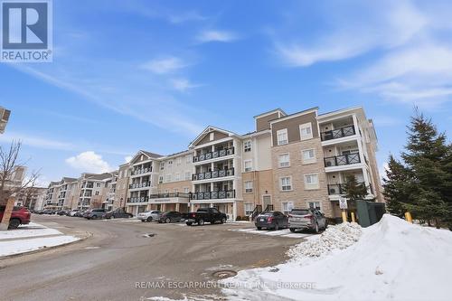 Visitor Parking - 107 - 1045 Nadalin Heights, Milton, ON - Outdoor With Facade