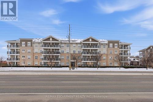 107 - 1045 Nadalin Heights, Milton, ON - Outdoor With Facade