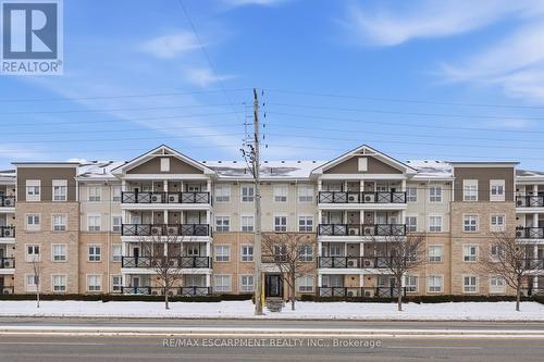 107 - 1045 Nadalin Heights, Milton, ON - Outdoor With Facade