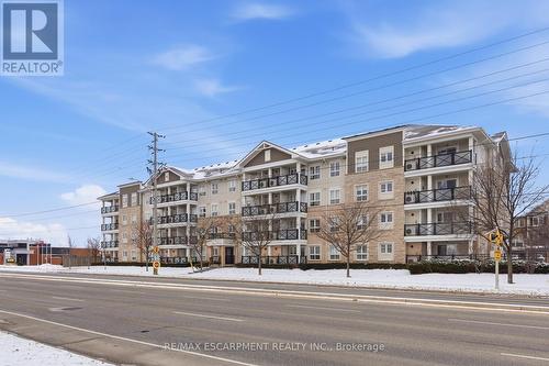 107 - 1045 Nadalin Heights, Milton, ON - Outdoor With Facade